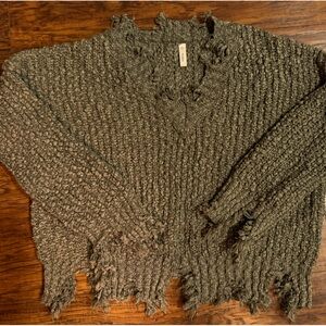 Crop Sweater with frayed hem, sleeves and neckline.
